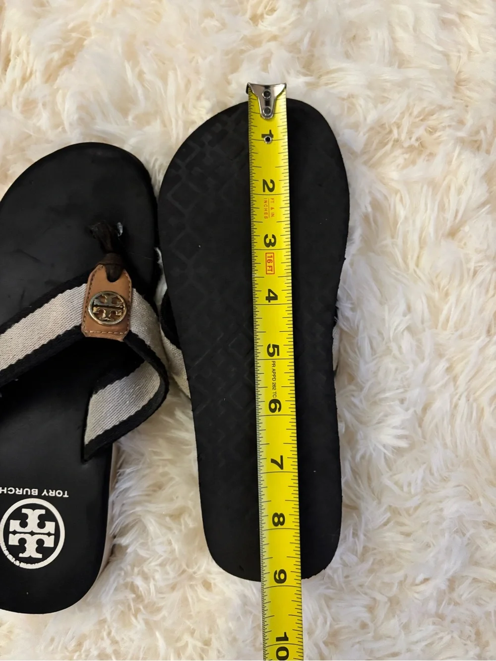 Tory Burch Black Flip Flop Sandals with Cream Straps and Gold Logo